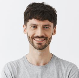 Young black-haired guy in gray t-shirt